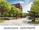 Modern Campus Park with Red Buildings