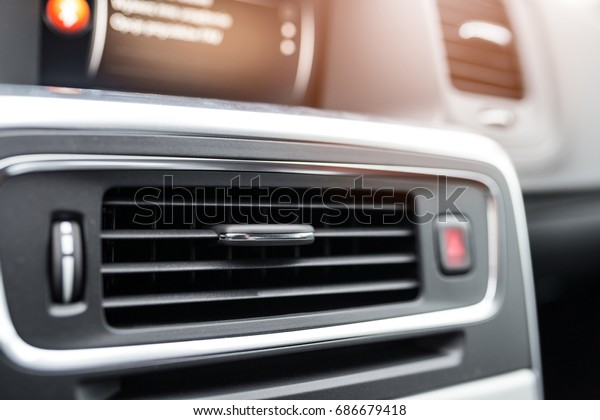 Modern car air\
condition vents, vehicle\
interior