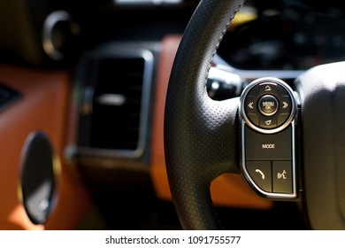 Modern Car Audio System Control Knob On A Steering Wheel With Voice Recognition, A Convenient Option In New Generation Cars             