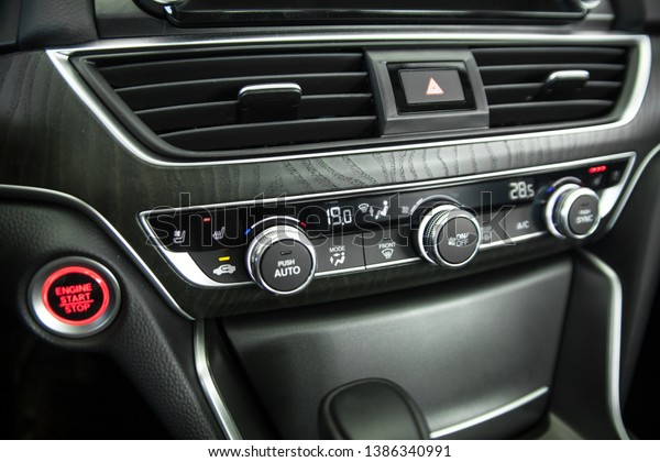 Modern car climate control\
panel