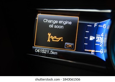 The Modern Car Dashboard Computer With Color Infographics Warns The Driver About Changing Engine Oil Soon. Color Multi-function Car Display