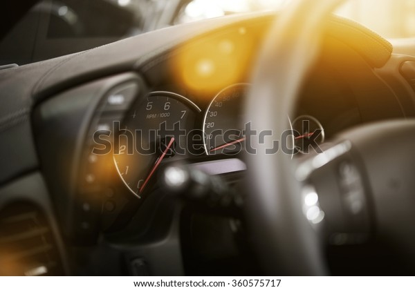 Modern Car Dashboard. Car Driving. Vehicle\
Steering Wheel and\
Dashboard.