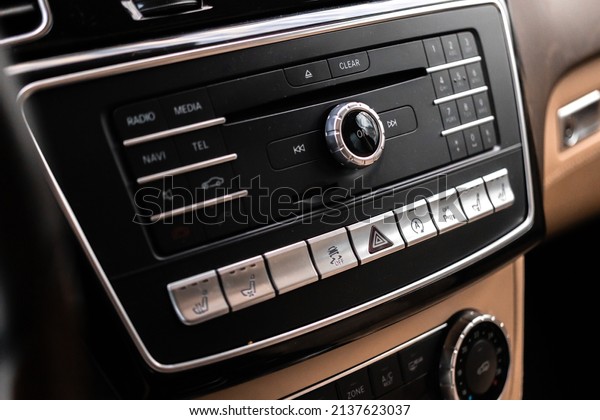 Modern car dashboard\
with multimedia screen. Interior detail, luxury vehicle close-up\
view background 