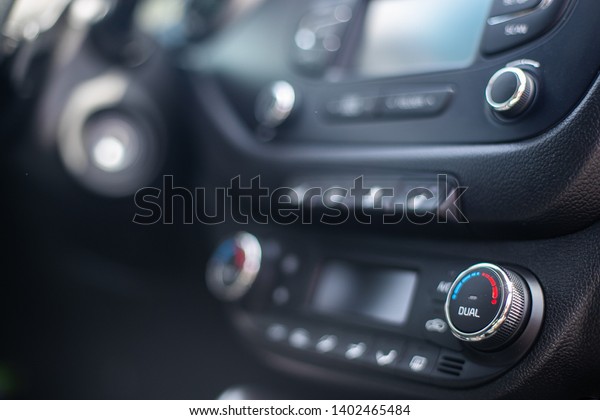 Modern car dashboard. Screen multimedia system.\
Climate control.