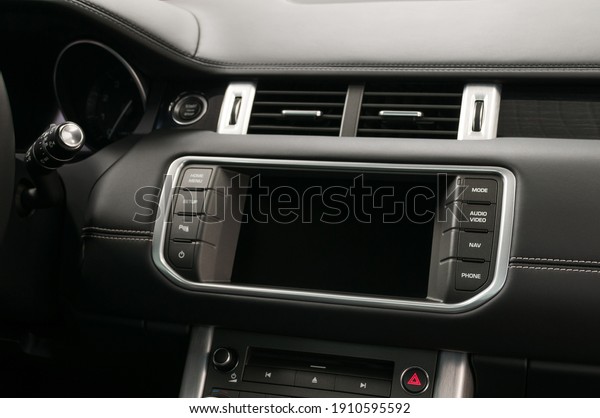 Modern car dashboard. Touch screen multimedia system.
Interior detail.  