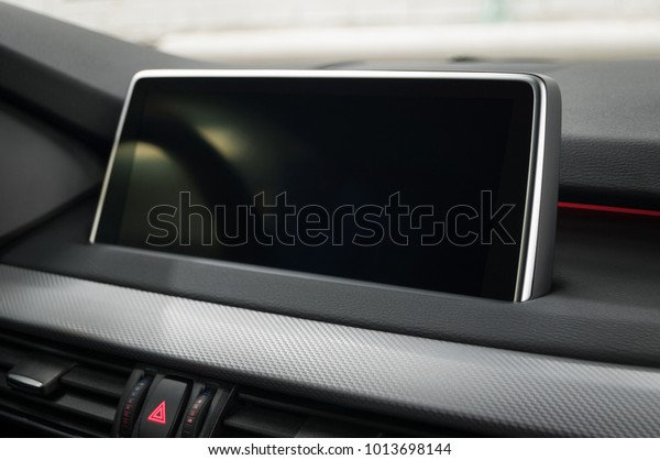 Modern car detail.\
Screen multimedia\
system.