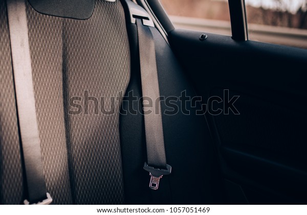 Modern car details, seatbelt on rear
car seats with upholstery and security
features