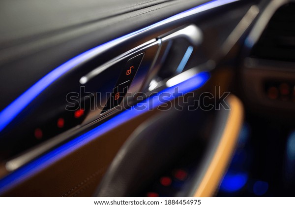 Modern car door\
lock buttons with\
backlights