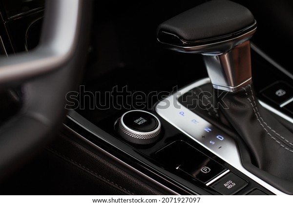 Modern car drive mode\
selector. Suspension and wheel drive control panel. Driving mode\
switch buttons.