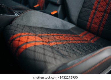 Modern Car Fabric Sports Seats With Red Stripes Close Up. Driver Seat Of Modern Sport Car