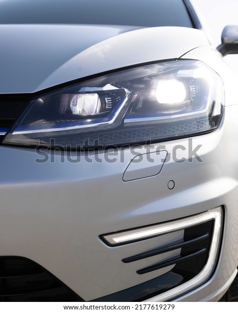 Modern car headlamp\
flashing light with blinking on continuously indicator. Car Front\
Full Led Light. Switched on led lights of luxury car. Car Blinker\
Light.
