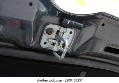 Modern Car Hood Lock. Close Up Engine Bonnet Lock. Modern Vehicle Hood Opening Lock.