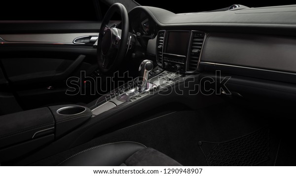 Modern car inside. Control panel and\
automatic transmission\
background.