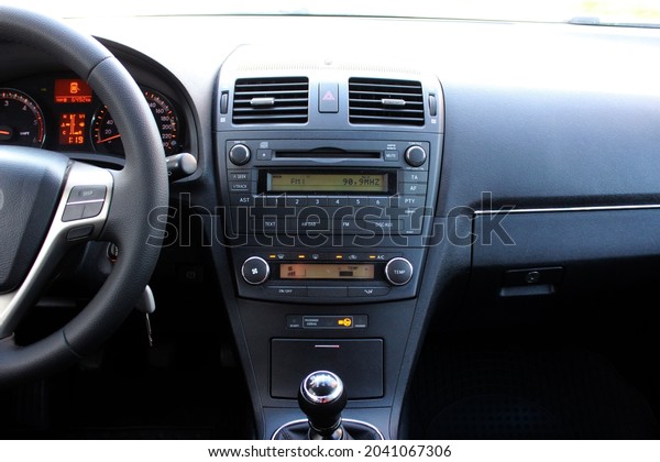 Modern car interior\
with dashboard front panel, Car multimedia and climate control.\
Dashboard of a modern\
car.