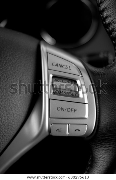 Modern car\
interior detail. Hands free \
control.