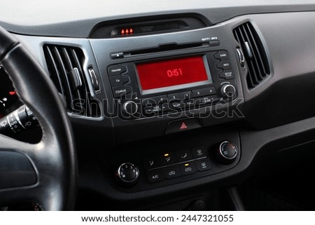Modern car interior with multimedia and climate control. Car dashboard. Modern car dashboard. Car climate control. Multimedia system.