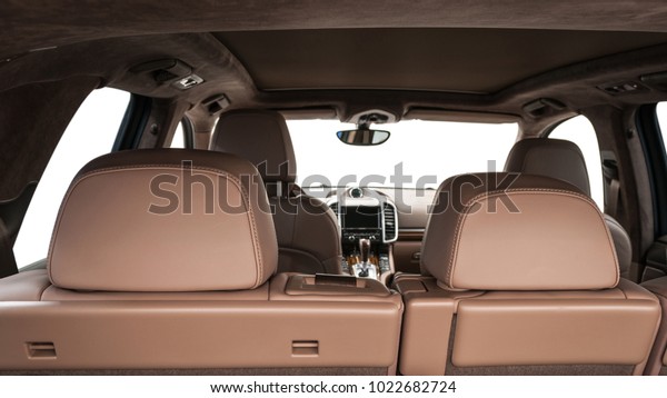Modern car interior. View\
from back.