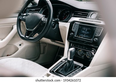 Modern Car Interior, White Perforated Leather, Aluminum, Black Lacquer, Leather Steering Wheel.