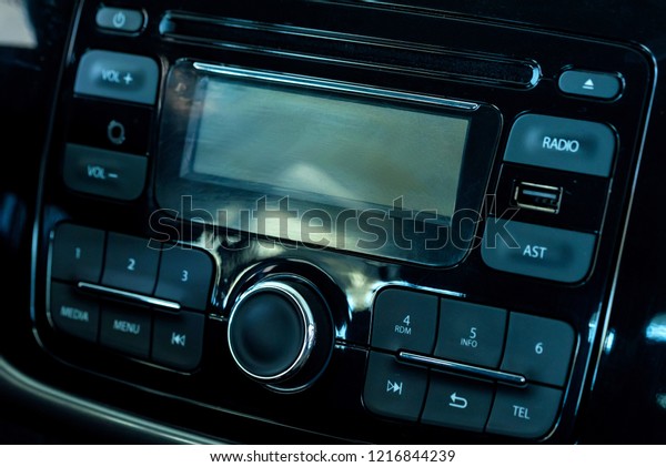 Modern car\
multimedia control panel close\
up