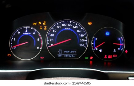 Modern Car Odometer With Illuminated Control Lamps. Modern Car Speedometer. Modern Car Dashboard.