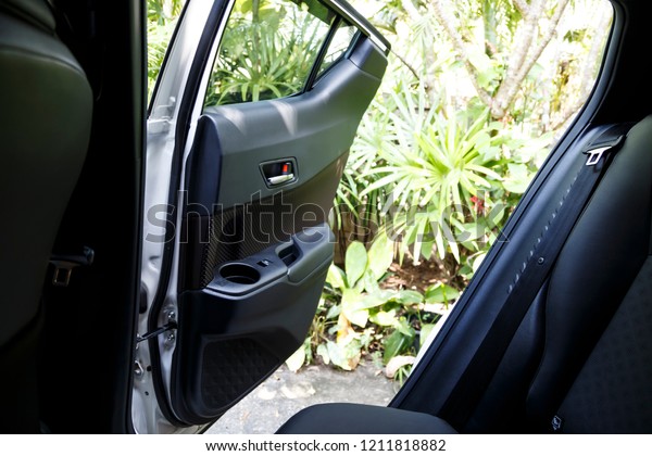 Modern car\
with open the door for exit into\
outdoors