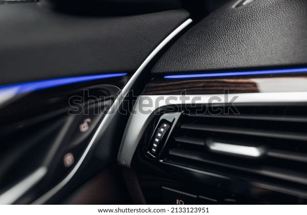 Modern car panel,
with leather and
backlight
