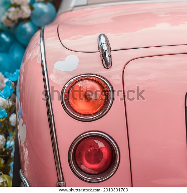 modern car with pink\
color