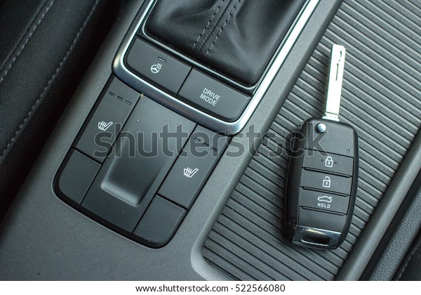 Modern Car\
remote control key in vehicle\
interior