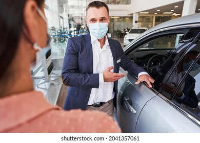 Modern Car Showroom Working With Safety Measures