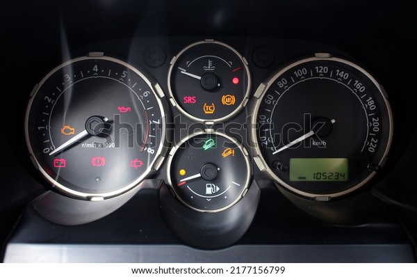 Modern car speedometer and odometer.\
Warning Lights In Your Car. Signs In Car\
Speedometer.