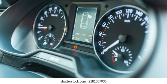 Modern Car Speedometer,odometer,tachometer And Illuminated Dashboard. Car Dashboard Modern Automobile Controlilluminated Panel Speed Display.Car Instrument Panel.Close Up.Selective Focus.