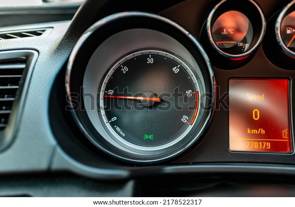 Modern car speedometer,odometer,tachometer and\
illuminated dashboard. car dashboard modern automobile\
controlilluminated panel speed display.Car instrument panel.Close\
up.Selective focus.