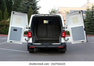 Modern Cargo Van With Open Empty Trunk. Modern Cargo Van Open Trunk. Car Boot Is Open. Modern Car With Open Empty Trunk.