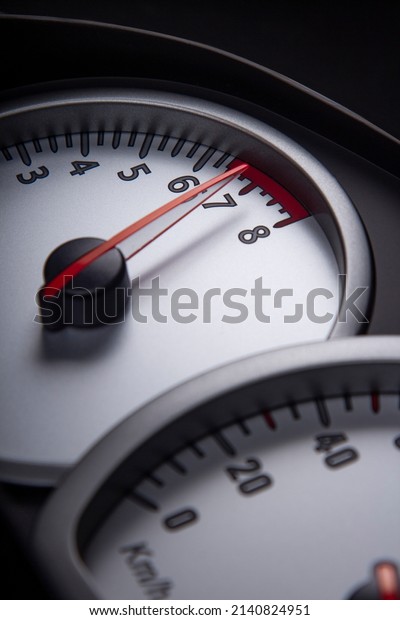 Modern car\'s dashboard. High speed concept -\
Car speedometer.\
close-up.