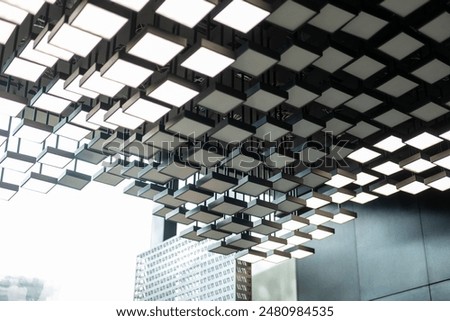 Similar – Image, Stock Photo Brightly illuminated grid structure against a red background
