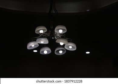 modern chandelier on the wall in black and white