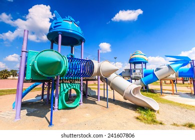 Modern Children Playground Slide In City Park - Amusement Park Playground