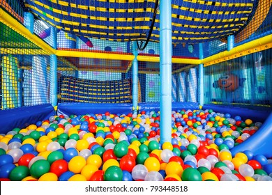 Modern Children's Playground Indoor. Inside The Colorful Plastic Structure For Active Games And Development Of Motor Skills. Large Dry Pool, Ball Pit. Kids Playground, Soft Gym In Kindergarten.