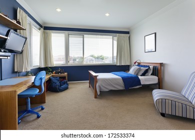 modern child's bedroom with white and blue decor