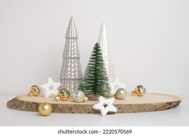 Modern Christmas trees. Decorative Beige, White and Green Christmas Decoration on a Wooden Stand with a Gray background. Nordic Festive Decor. Boho, Scandinavian Style Design. Trendy Minimal Ornament. - Powered by Shutterstock