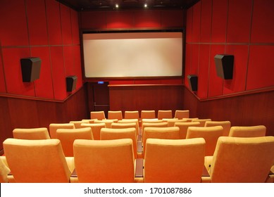 Modern Cinema Hall Empty And Beige Comfortable Seats, Movie Theater Seats Or Chair, White Cinema Screen