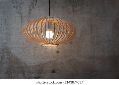 Modern Circle Wooden Ceiling Lamp Light Bulbs With Cement Wall Loft-style Interior For An Office Building Or Home And Living Decoration. Concept Plywood Applied Furniture Contemporary.