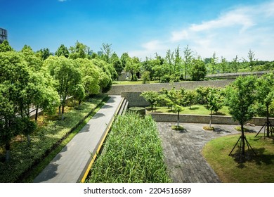 Modern city park in daytime, landscaped with greenery