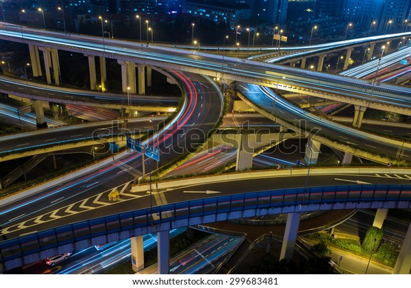 Modern city traffic road night. Aerial
Transport road junction.