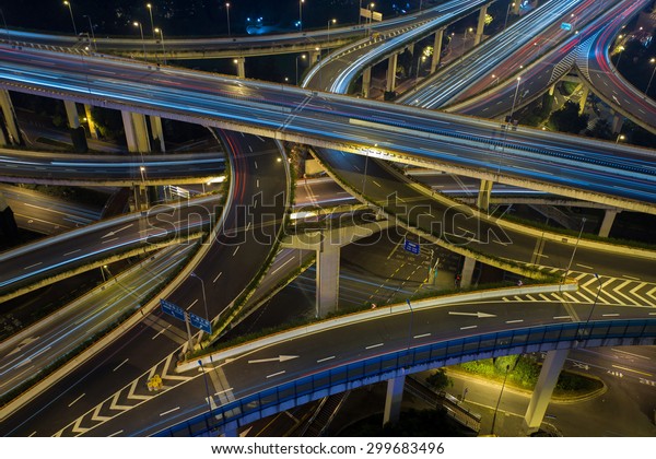 Modern city traffic road night. Aerial Transport road\
junction. 