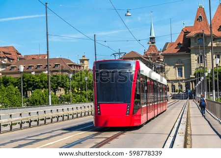 Modern city tram in Bern in a beautiful summer day, Switzerland