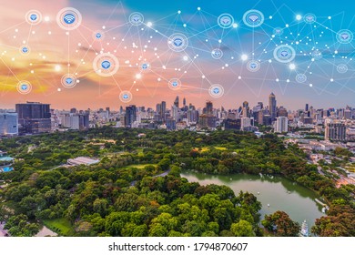 Modern city at twilight with network connection wireless communication  concept