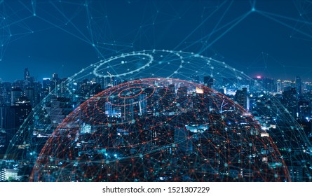 Modern city with wireless network connection and city scape concept.Wireless network and Connection technology concept with city background at night.