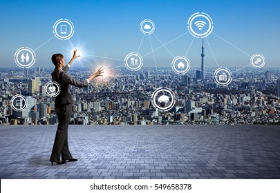 modern cityscape and business person, Internet of Things, Information Communication Technology, abstract image visual - Shutterstock ID 549658378