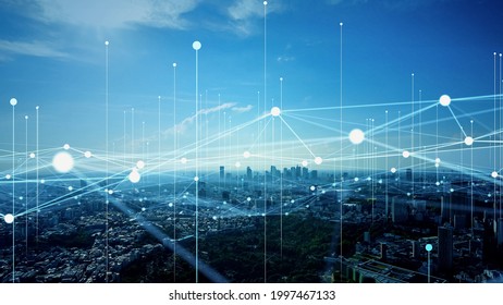 Modern cityscape and communication network concept. Telecommunication. IoT (Internet of Things). ICT (Information communication Technology). 5G. Smart city. Digital transformation. - Shutterstock ID 1997467133